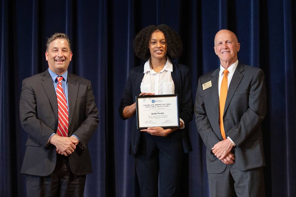Dr. Robert Smart, Vice Provost of Research Administration and Scholarship (left), Jayla Wesley (middle), and Dr. Jeffrey Potteiger, Associate Vice-Provost of The Graduate School (right).